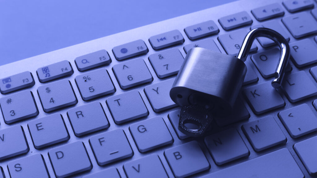Computer keyboard with unlocked padlock